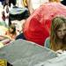 University of Michigan freshman Megan Hullman paints her paper mache creation on Friday, April 5. Daniel Brenner I AnnArbor.com